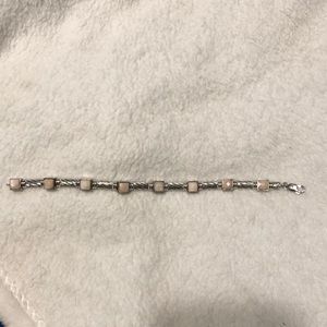 Women’s silver-tone bracelet with pink stones